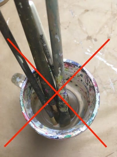 the wrong way to dry acrylic brushes with bristles down